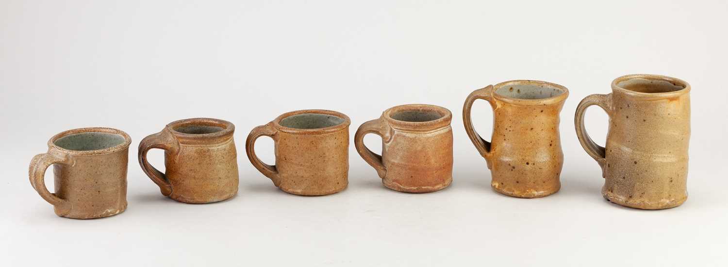 LINDA CHRISTIANSON (born 1952); two wood fired stoneware mugs, tallest 11cm, and a set of four - Image 2 of 4