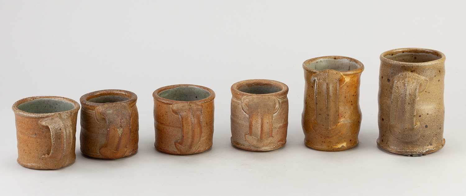 LINDA CHRISTIANSON (born 1952); two wood fired stoneware mugs, tallest 11cm, and a set of four - Image 3 of 4