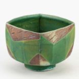 JEFF OESTREICH (born 1947); a square faceted stoneware chawan, impressed JO mark, diameter 12.5cm.