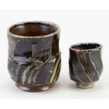 † RUTHANNE TUDBALL (born 1948); a stoneware yunomi covered in soda glaze, impressed RAT mark, height