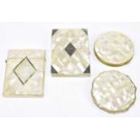 Two mother of pearl compacts, together with two mother of pearl card cases.