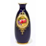 ROYAL WORCESTER; a hand painted cylindrical vase with a circular panel decorated with fruit,