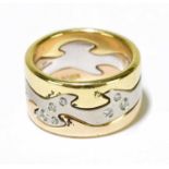 GEORG JENSEN; an 18ct three colour gold and diamond set 'Fusion' ring, size 50 (K centre), approx.