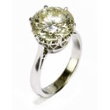 An 18ct yellow gold diamond solitaire ring, the six claw set round brilliant cut stone, clarity