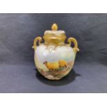 HARRY DAVIS FOR ROYAL WORCESTER; a twin handled potpourri and cover, hand painted with sheep in