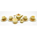 LINTHORPE; a part tea set comprising a teapot, four cups, fours saucers, a cream jug and a sugar