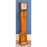 An Art Deco walnut longcase clock of small proportions, the silvered dial set with Arabic