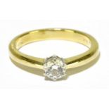 An 18ct yellow gold diamond solitaire ring, the round brilliant cut stone approx. 0.33cts, in six