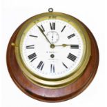 WORDLEY; a brass ship's clock, the enamelled dial set with Roman numerals and subsidiary seconds