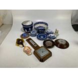 A quantity of decorative ceramics to include blue and white, Wedgwood, two ceramic masks and two