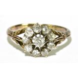 An 18ct yellow gold and ten stone diamond set cluster ring, size P, approx. 2.9g, the ring head