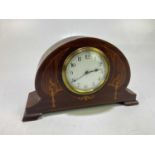 A mahogany inlaid mantel clock, with white enamel face set with Arabic numerals, height 16cm.