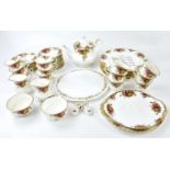 ROYAL ALBERT; a quantity of 'Old Country Roses' pattern tea/dinner ware, to include firsts and