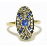 An 18ct gold sapphire and diamond ring in the Art Deco taste with raised oval platform, size K,