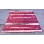 OKA; a Indian made knotted rug, approx 317 x 232cm. Condition Report: 100% cotton, pulls throughout,
