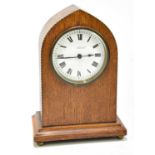 LAMBERT WOLF, MANCHESTER; a late 19th century inlaid oak lancet mantel clock, the enamel dial set