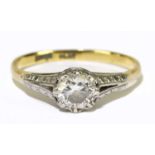 An 18ct yellow gold and platinum tipped diamond solitaire ring, the central stone approx. 0.50cts,
