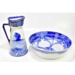 ROYAL DOULTON; a blue and white children's ware jug and bowl in the 'Aubrey' pattern, height of