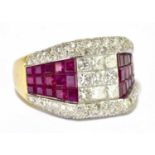 An 18ct yellow gold invisible set diamond and ruby ring in the Art Deco style, size M, approx weight