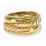 An 18ct yellow gold ring with textured ribbed central band, size P, approx. 10.3g.