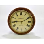 BURREL OF SHEFFIELD; an oak cased circular wall clock, with white enamelled face set with Roman