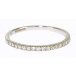 An 18ct white gold and diamond set half eternity ring with brilliant cut stones, size R, approx 1.