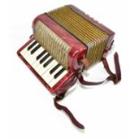 HOHNER; a Mignoni piano accordion.