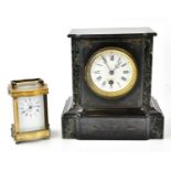 A Victorian slate and marble mantel clock, the enamel dial set with Roman numerals, height 23cm,