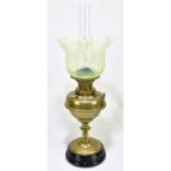 A Victorian brass oil lamp, with vaseline glass shade, moulded with floral detail, with Young's