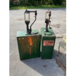 ESSO; a pair of green painted metal oil dispensers, height 133cm.
