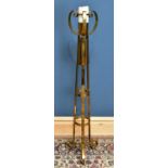 A brass church candle holder, height 130cm.