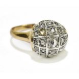 An Indian yellow metal domed diamond set dress ring, approximate size O 1/2, approximate weight 5.