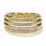 An 18ct yellow gold and diamond ring formed of eight bands set at different heights all set with