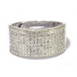 A large 18ct white gold pave diamond set ring, the diamonds totalling approx. 1ct, size X 1/2,