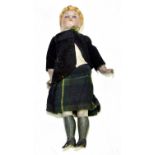 An unusual German bisque headed doll modelled as a boy, with bisque articulated arms and legs,