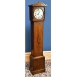 An early 20th century oak cased longcase clock of small proportions, the silvered dials with Roman
