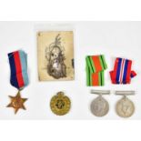 Three WWII medals comprising the Defence Medal, the 1939-45 Medal and the 39-45 Star, together