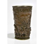 A late 19th century Continental copper beaker (originally silver-plated), relief decorated with