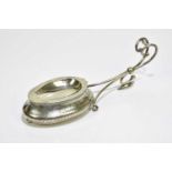 A late Victorian unusual spoon warmer with detachable tray and chased decoration, length 30cm.