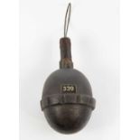 An inert WWI period German 'egg' grenade.