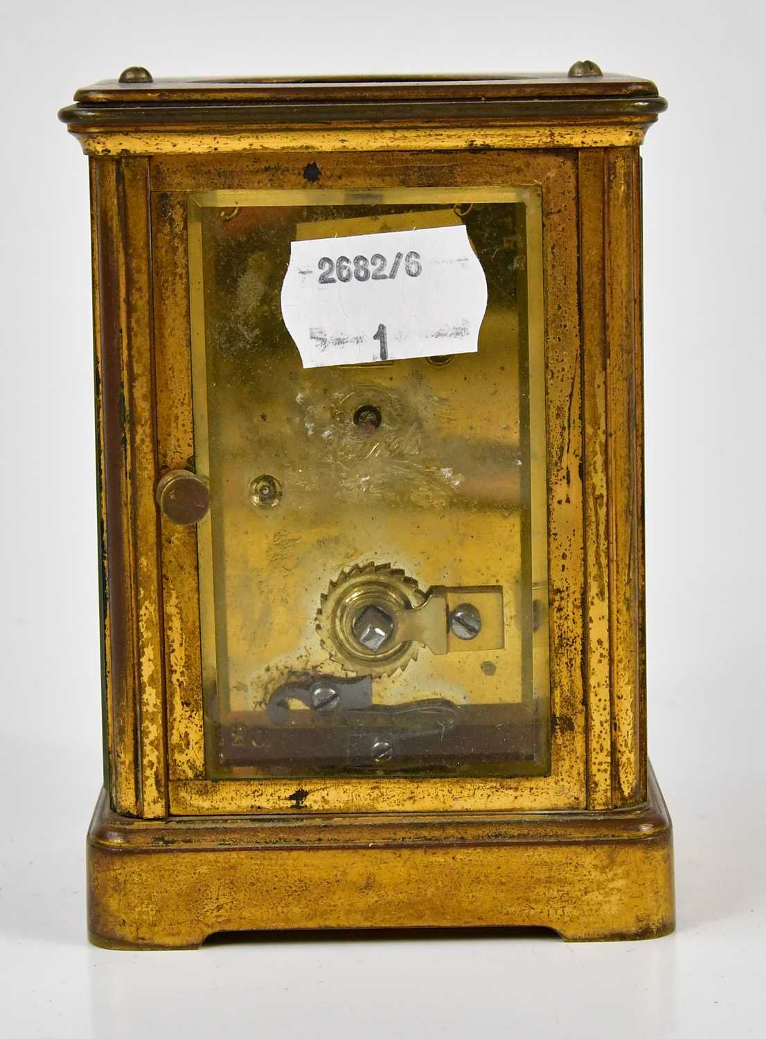 A late 19th century brass cased carriage clock, the enamel dial bearing Arabic and Roman numerals, - Image 3 of 4