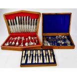 An oak cased canteen of silver plated twelve setting fish knifes and forks with ivorine handles,