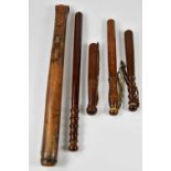 A Victorian horseman's truncheon in spring loaded leather case, overall 66cm, together with three