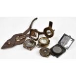 Four military compasses, with a set of cast metal wire cutters (5)