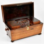 A 19th century rosewood tea caddy, the hinged cover enclosing a cut glass mixing bowl and two