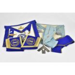 A small quantity of assorted Masonic regalia, to include cuffs, aprons, etc.