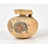 An unusual Greek Corinthian vase, possibly an (aryballos) olive oil holder decorated with Olympic