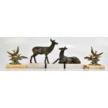 An Art Deco bronzed spelter model of a stag and doe on a marble plinth base, length 34cm, together