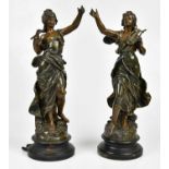 Two spelter figures, 'Nélodie' and 'Le Dessin', indistinctly signed, height 46cm.