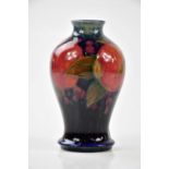 MOORCROFT; a 'Pomegranate' pattern vase, height 15cm.